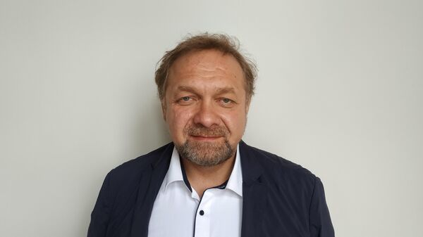 Коктыш: киевскому истеблишменту выгодно полное растворение Украины - Sputnik Беларусь