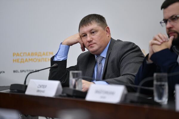 Доцент кафедры политологии БГЭУ, кандидат исторических наук Алексей Беляев Доцент кафедры политологии БГЭУ, кандидат исторических наук Алексей Беляев - Sputnik Беларусь